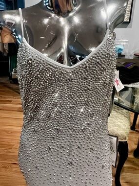 Silver beaded evening gown